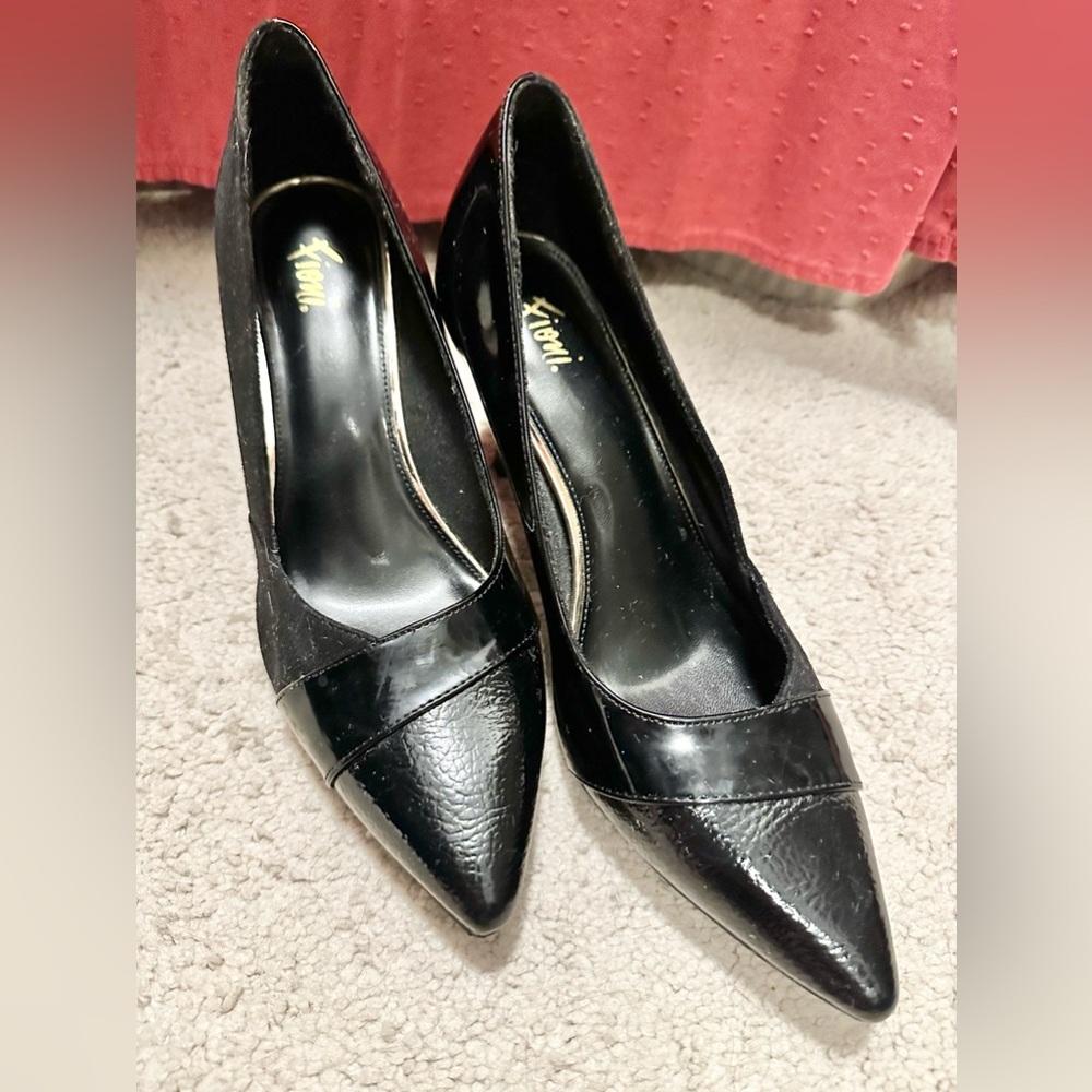 Women’s black heeled pumps